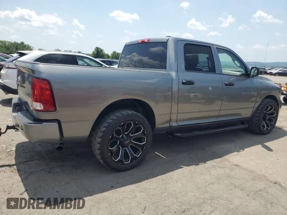 2011 Ram 1500 ST с VIN 1D7RB1CPXBS550612, выставлен на аукционе Copart как лот 62673545 с пробегом 112 179 миль миль и Списание • Salvage title. История ставок и продаж доступна на DreamBid. Изображение 3.