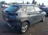 2019 Hyundai Kona SE z VIN KM8K1CAAXKU270861, wystawiony jako IAAI lot #43533383 z przebiegiem 128 687 mil mil oraz . Historia ofert i sprzedaży dostępna na DreamBid. Obrazek 4.