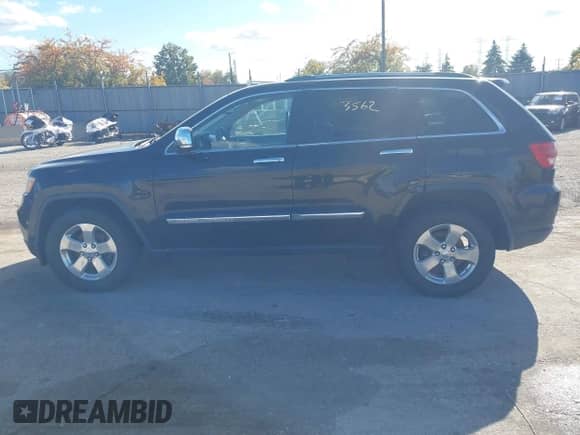 2013 Jeep Grand Cherokee Limited z VIN 1C4RJFBG4DC541915, wystawiony jako IAAI lot #43533562 z przebiegiem 164 436 mil mil oraz . Historia ofert i sprzedaży dostępna na DreamBid. Obrazek 14.