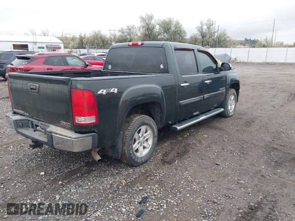 2013 GMC Sierra 1500 SLE z VIN 3GTP2VE75DG231117, wystawiony jako IAAI lot #43475156 z przebiegiem 99 209 mil mil oraz . Historia ofert i sprzedaży dostępna na DreamBid. Obrazek 4.