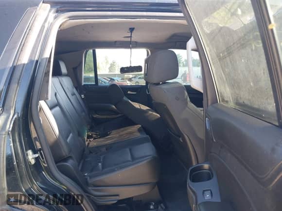 2015 Chevrolet Tahoe Commercial z VIN 1GNSK3EC4FR563538, wystawiony jako IAAI lot #42779734 z przebiegiem 154 719 mil mil oraz . Historia ofert i sprzedaży dostępna na DreamBid. Obrazek 8.