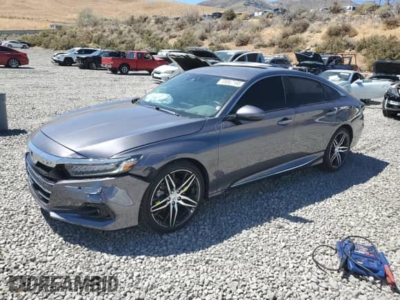 2021 Honda Accord Touring z VIN 1HGCV2F93MA018798, wystawiony jako Copart lot #69067185 z przebiegiem 24 925 mil mil oraz Szkoda całkowita • Salvage title. Historia ofert i sprzedaży dostępna na DreamBid. Obrazek 1.