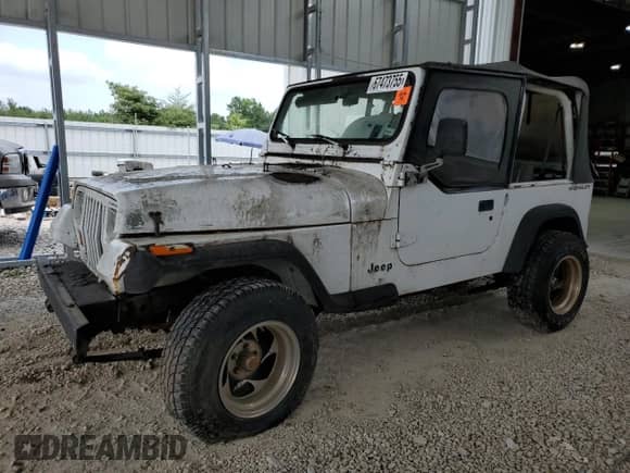 1995 Jeep Wrangler S с VIN 1J4FY19P1SP262512, выставлен на аукционе Copart как лот 67473755 с пробегом 195 157 миль миль и Чистый • Clean title. История ставок и продаж доступна на DreamBid. Изображение 1.