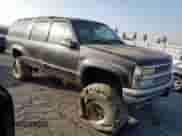 1996 Chevrolet Suburban with VIN 1GNFK16R4TJ409561, listed as a Copart auction lot 83247624 with 146,933 mi miles and Clean title. Bid and sale history available at DreamBid. Image 4.