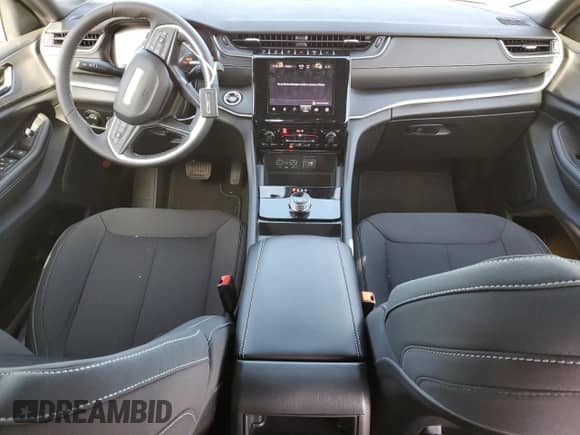 2025 Jeep Grand Cherokee Laredo with VIN 1C4RJHAG0SC268997, listed as a Copart auction lot 45860945 with 1,036 mi miles and Salvage title. Bid and sale history available at DreamBid. Image 8.