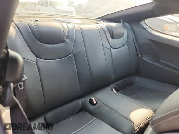 2014 Hyundai Genesis Coupe Ultimate с VIN KMHHU6KJ4EU115678, выставлен на аукционе Copart как лот 71717355 с пробегом 21 433 миль миль и Списание • Salvage title. История ставок и продаж доступна на DreamBid. Изображение 10.