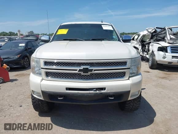 2012 Chevrolet Silverado 1500 LTZ z VIN 3GCPKTE71CG232543, wystawiony jako IAAI lot #42803535 z przebiegiem 154 377 mil mil oraz . Historia ofert i sprzedaży dostępna na DreamBid. Obrazek 12.