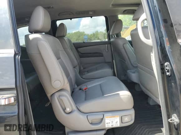 2013 Honda Odyssey EX-L z VIN 5FNRL5H64DB069561, wystawiony jako Copart lot #69430015 z przebiegiem 207 215 mil mil oraz Szkoda całkowita • Salvage title. Historia ofert i sprzedaży dostępna na DreamBid. Obrazek 11.