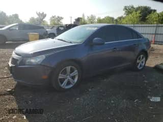 2014 Chevrolet Cruze 2LT with VIN 1G1PE5SB9E7255359, listed as a Copart auction lot 68766255 with 137,188 mi miles and Salvage title. Bid and sale history available at DreamBid. Image 1.