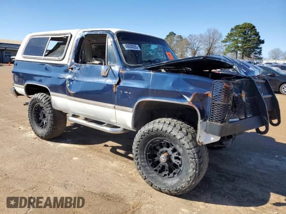 1984 Chevrolet Blazer K10 Utility HT with VIN 1G8EK18HXEF147649, listed as a Copart auction lot 48030265 with 77,593 mi miles and Salvage title. Bid and sale history available at DreamBid. Image 4.
