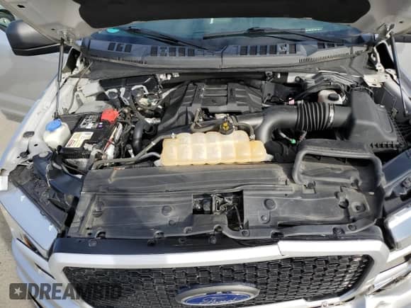 2018 Ford F-150 XL z VIN 1FTEW1EP0JFA54462, wystawiony jako Copart lot #90871535 z przebiegiem 70 194 mil mil oraz Szkoda całkowita • Salvage title. Historia ofert i sprzedaży dostępna na DreamBid. Obrazek 11.