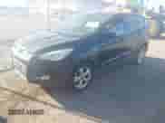 2014 Ford Escape SE with VIN 1FMCU0GX9EUA94394, listed as a IAAI auction lot 43392846 with 131,570 mi miles and . Bid and sale history available at DreamBid. Image 2.