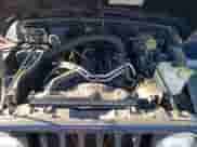 2000 Jeep Wrangler Sport z VIN 1J4FA49S2YP720061, wystawiony jako Copart lot #85644025 z przebiegiem 117 772 mil mil oraz Czysty tytuł • Clean title. Historia ofert i sprzedaży dostępna na DreamBid. Obrazek 11.