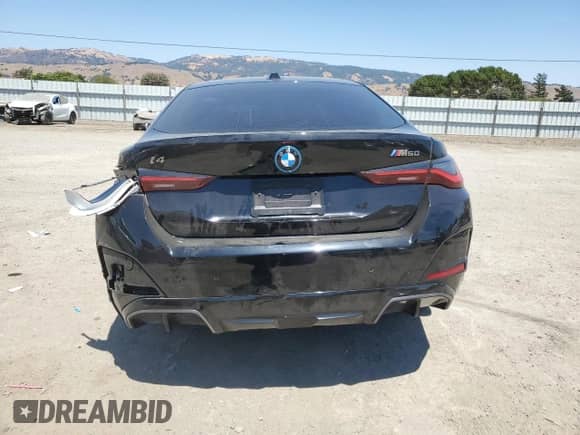 2024 BMW i4 M50 с VIN WBY33AW00RFS46735, выставлен на аукционе Copart как лот 65038055 с пробегом 20 364 миль миль и Списание • Salvage title. История ставок и продаж доступна на DreamBid. Изображение 6.