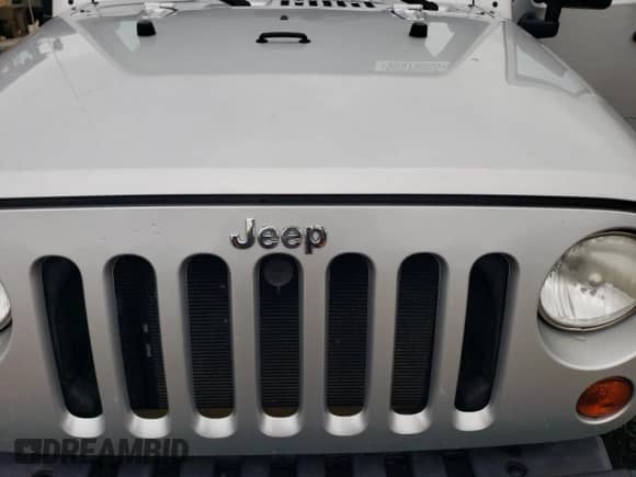 2012 Jeep Wrangler Sport with VIN 1C4AJWAG2CL117209, listed as a Copart auction lot 90579055 with 48,119 mi miles and Clean title. Bid and sale history available at DreamBid. Image 11.