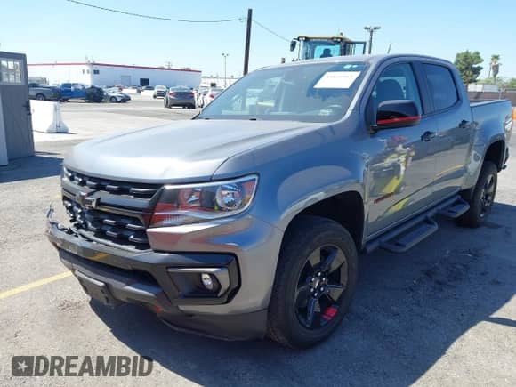 2021 Chevrolet Colorado 2WD LT z VIN 1GCGSCEN2M1111518, wystawiony jako IAAI lot #43166161 z przebiegiem 21 197 mil mil oraz . Historia ofert i sprzedaży dostępna na DreamBid. Obrazek 2.