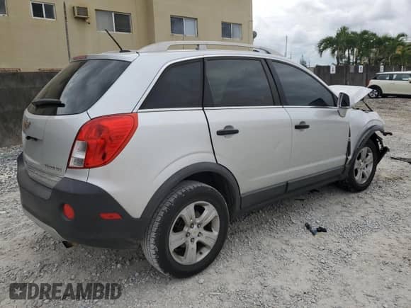 2014 Chevrolet Captiva Sport LS с VIN 3GNAL2EK5ES635966, выставлен на аукционе Copart как лот 80499104 с пробегом 137 463 миль миль и Списание • Salvage title. История ставок и продаж доступна на DreamBid. Изображение 3.