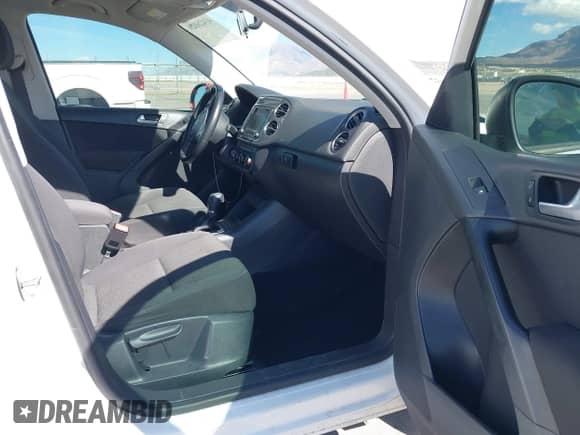 2014 Volkswagen Tiguan S with VIN WVGAV3AX0EW554013, listed as a IAAI auction lot 43426029 with 122,127 mi miles and . Bid and sale history available at DreamBid. Image 5.