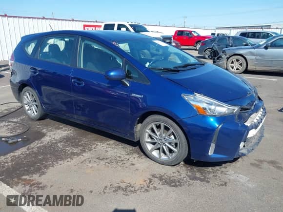 2015 Toyota Prius Two z VIN JTDZN3EU0FJ036229, wystawiony jako IAAI lot #42007222 z przebiegiem 78 107 mil mil oraz . Historia ofert i sprzedaży dostępna na DreamBid. Obrazek 1.