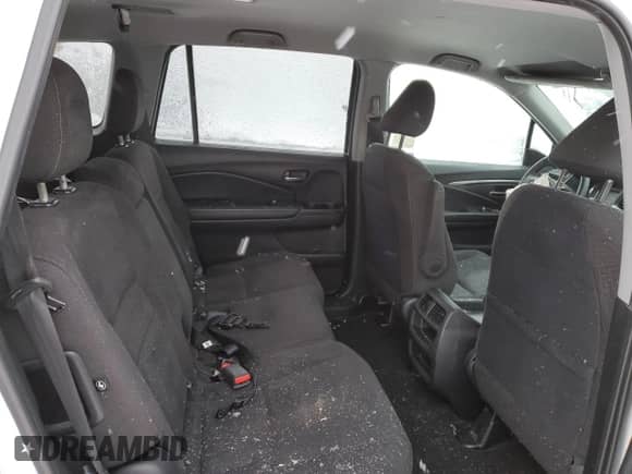 2018 Honda Pilot LX с VIN 5FNYF5H13JB005594, выставлен на аукционе Copart как лот 87054304 с пробегом Не указан миль и Списание • Salvage title. История ставок и продаж доступна на DreamBid. Изображение 11.