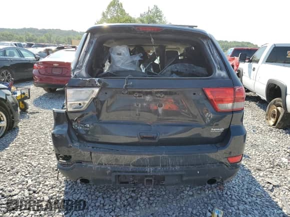 2011 Jeep Grand Cherokee 70th Anniversary z VIN 1J4RR4GT0BC632321, wystawiony jako Copart lot #66772334 z przebiegiem 203 708 mil mil oraz Szkoda całkowita • Salvage title. Historia ofert i sprzedaży dostępna na DreamBid. Obrazek 6.