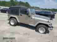 2005 Jeep Wrangler X с VIN 1J4FA39S25P301939, выставлен на аукционе Copart как лот 62480995 с пробегом 205 441 миль миль и Списание • Salvage title. История ставок и продаж доступна на DreamBid. Изображение 4.