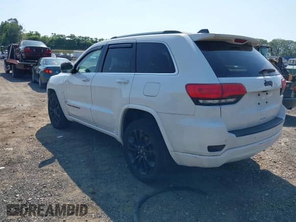 2018 Jeep Grand Cherokee Altitude with VIN 1C4RJFAG9JC162874, listed as a IAAI auction lot 42396844 with 102,321 mi miles and . Bid and sale history available at DreamBid. Image 3.