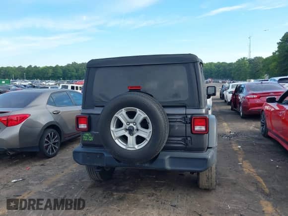 2020 Jeep Wrangler Sport S with VIN 1C4GJXAG9LW303604, listed as a IAAI auction lot 42221305 with 71,189 mi miles and . Bid and sale history available at DreamBid. Image 16.