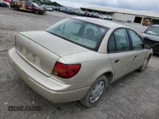 2000 Saturn SL z VIN 1G8ZH528XYZ223681, wystawiony jako Copart lot #57347404 z przebiegiem 161 044 mil mil oraz Czysty tytuł • Clean title. Historia ofert i sprzedaży dostępna na DreamBid. Obrazek 3.