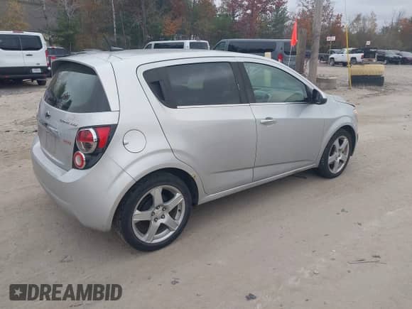 2014 Chevrolet Sonic LTZ with VIN 1G1JE6SB3E4226484, listed as a IAAI auction lot 43583999 with 114,708 mi miles and . Bid and sale history available at DreamBid. Image 4.