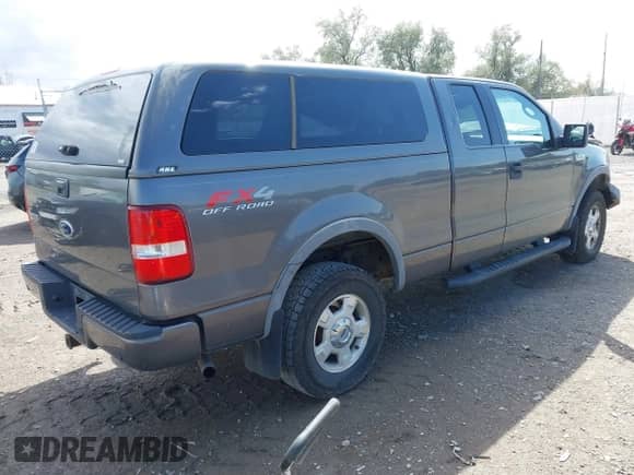 2005 Ford F-150 XLT with VIN 1FTPX14575FA86014, listed as a IAAI auction lot 43193154 with 171,713 mi miles and . Bid and sale history available at DreamBid. Image 4.