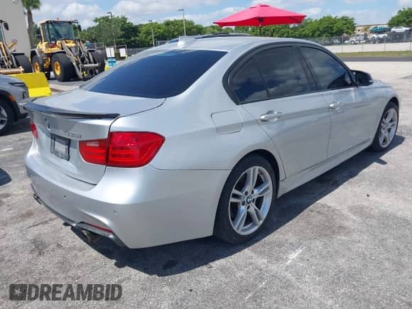 2014 BMW 3 Series 335i xDrive with VIN WBA3B9G53ENR91523, listed as a IAAI auction lot 42310365 with 137,330 mi miles and . Bid and sale history available at DreamBid. Image 4.