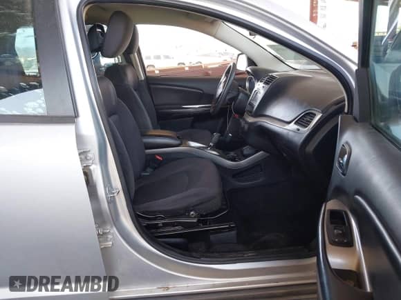 2014 Dodge Journey American Value with VIN 3C4PDCABXET285286, listed as a IAAI auction lot 42944902 with 169,650 mi miles and . Bid and sale history available at DreamBid. Image 5.