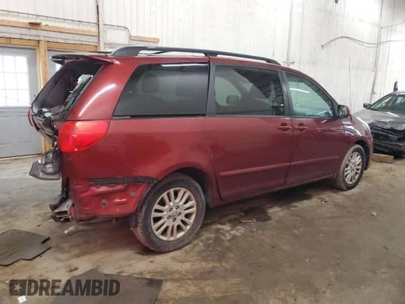 2010 Toyota Sienna XLE с VIN 5TDYK4CC9AS298444, выставлен на аукционе Copart как лот 69422175 с пробегом 245 524 миль миль и Списание • Salvage title. История ставок и продаж доступна на DreamBid. Изображение 3.
