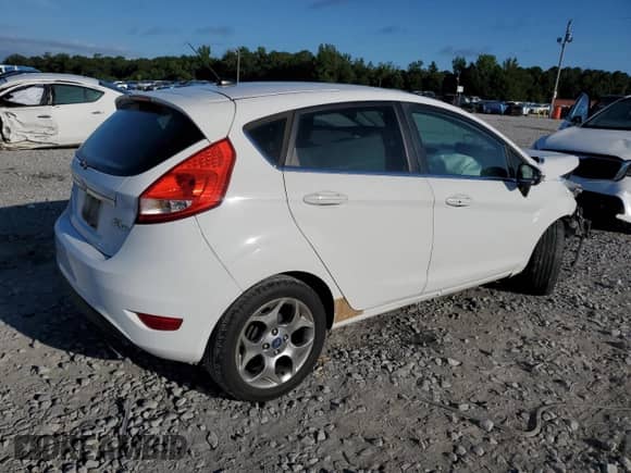 2012 Ford Fiesta SES with VIN 3FADP4FJXCM149804, listed as a Copart auction lot 66252235 with 182,098 mi miles and Salvage title. Bid and sale history available at DreamBid. Image 3.