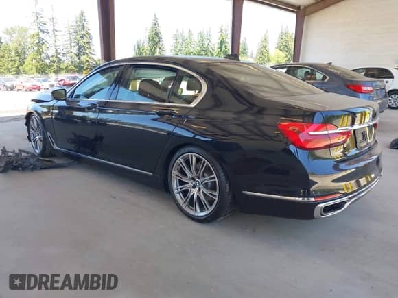 2017 BMW 7 Series 750i with VIN WBA7F0C59HGM21185, listed as a IAAI auction lot 42360146 with Not provided miles and . Bid and sale history available at DreamBid. Image 3.