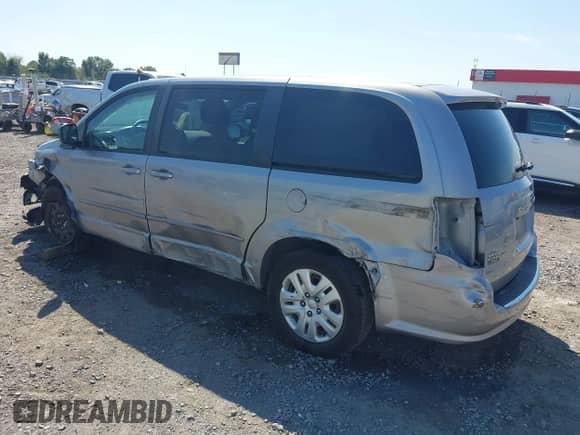 2015 Dodge Grand Caravan SE Plus with VIN 2C4RDGBGXFR540615, listed as a IAAI auction lot 43135303 with 77,597 mi miles and . Bid and sale history available at DreamBid. Image 3.