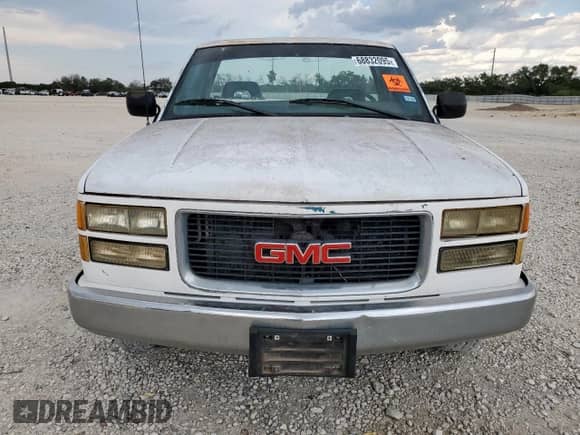 1994 GMC Sierra 1500 z VIN 1GTDC14Z1RZ501012, wystawiony jako Copart lot #68832095 z przebiegiem 94 450 mil mil oraz Szkoda całkowita • Salvage title. Historia ofert i sprzedaży dostępna na DreamBid. Obrazek 5.