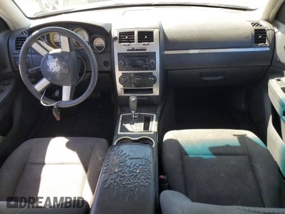 2010 Dodge Charger SXT with VIN 2B3CA3CV7AH226201, listed as a Copart auction lot 70313204 with 189,251 mi miles and Salvage title. Bid and sale history available at DreamBid. Image 8.