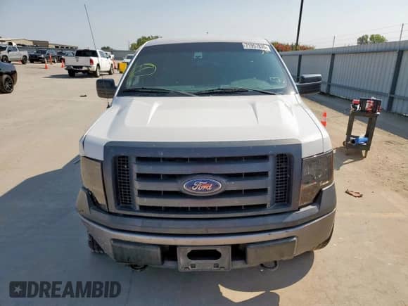 2013 Ford F-150 XL с VIN 1FTFX1EF8DKE87175, выставлен на аукционе Copart как лот 71957835 с пробегом 378 736 миль миль и Списание • Salvage title. История ставок и продаж доступна на DreamBid. Изображение 5.