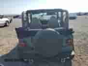 1998 Jeep Wrangler SE z VIN 1J4FY29P0WP758526, wystawiony jako Copart lot #70364935 z przebiegiem 126 356 mil mil oraz Szkoda całkowita • Salvage title. Historia ofert i sprzedaży dostępna na DreamBid. Obrazek 6.