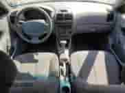 2005 Hyundai Accent GLS z VIN KMHCG45C35U622963, wystawiony jako Copart lot #68292114 z przebiegiem 137 655 mil mil oraz Szkoda całkowita • Salvage title. Historia ofert i sprzedaży dostępna na DreamBid. Obrazek 8.