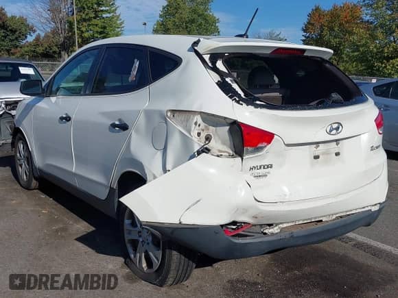 2012 Hyundai Tucson GL z VIN KM8JT3AB9CU447741, wystawiony jako IAAI lot #43370135 z przebiegiem 115 880 mil mil oraz . Historia ofert i sprzedaży dostępna na DreamBid. Obrazek 3.