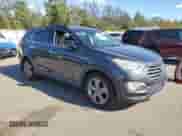 2014 Hyundai Santa Fe Limited с VIN KM8SNDHF6EU057115, выставлен на аукционе Copart как лот 70477405 с пробегом 128 959 миль миль и Чистый • Clean title. История ставок и продаж доступна на DreamBid. Изображение 4.