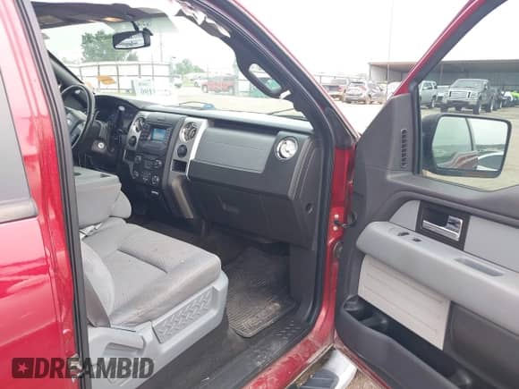 2013 Ford F-150 Lariat with VIN 1FTFW1ET0DKG07088, listed as a IAAI auction lot 42671190 with 202,968 mi miles and . Bid and sale history available at DreamBid. Image 5.