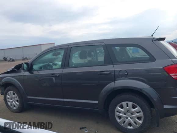 2015 Dodge Journey American Value z VIN 3C4PDCAB9FT620121, wystawiony jako IAAI lot #43000706 z przebiegiem 80 120 mil mil oraz . Historia ofert i sprzedaży dostępna na DreamBid. Obrazek 15.