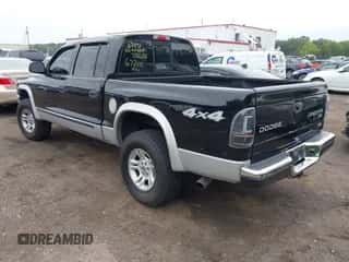 2004 Dodge Dakota SLT z VIN 1D7HG48N34S677100, wystawiony jako IAAI lot #42885294 z przebiegiem Nie podano mil oraz . Historia ofert i sprzedaży dostępna na DreamBid. Obrazek 3.