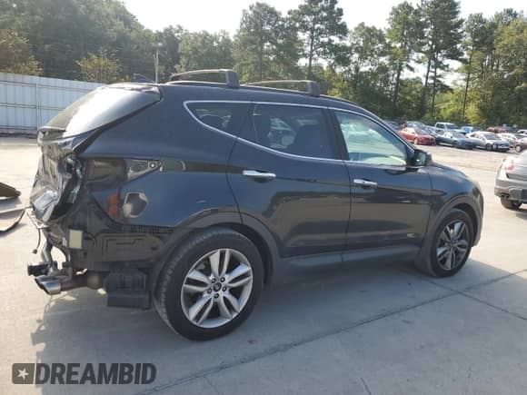 2016 Hyundai Santa Fe с VIN 5XYZW4LA6GG313060, выставлен на аукционе Copart как лот 70891195 с пробегом 233 802 миль миль и Списание • Salvage title. История ставок и продаж доступна на DreamBid. Изображение 3.