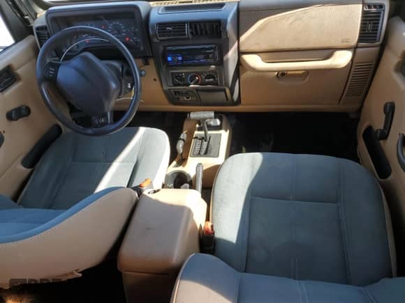 2001 Jeep Wrangler Sahara с VIN 1J4FA59S31P372167, выставлен на аукционе Copart как лот 65828905 с пробегом 170 902 миль миль и Списание • Salvage title. История ставок и продаж доступна на DreamBid. Изображение 8.