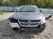 2013 Dodge Journey SXT with VIN 3C4PDCBB9DT722370, listed as a Copart auction lot 57086485 with 135,423 mi miles and Salvage title. Bid and sale history available at DreamBid. Image 5.